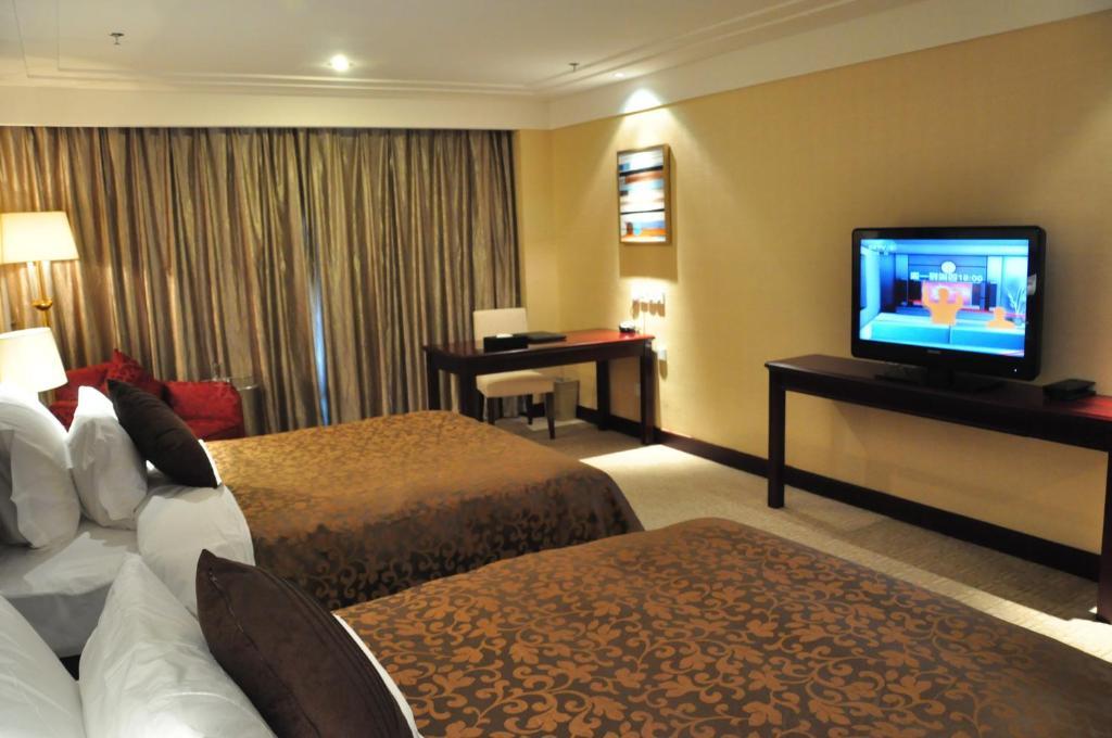 New Cozy Harbour Hotel Nanning Camera foto
